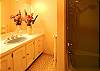 Lower level bathroom with a tub/shower.