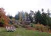 The Main House sits on a rocky knoll overlooking Boss Lake and about ten acres of manicured lawns.