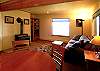 There is lots of light in the lower level family room for reading, games and foosball.