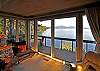 Deck and living area overlook the cove.