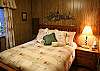 The back bedroom also has a queen size bed.