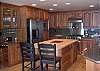 Great kitchen with SS appliances and a work island.