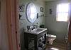 Lovely design touches in the guest bath.