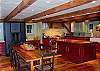 The country kitchen table in the "Barn" has wings so that it can seat twenty.