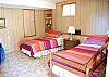 Third bedroom has two twin beds.