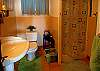 Spacious lower level bathroom with a shower