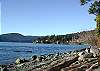 From the beach one can see the small hamlet of Olga across Buck Bay. Or watch the ferries docking at Lopez Island gaze across to the Olympic Mountains in the distance.