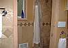 Stall shower in master bath.