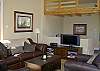 The great room offers plush leather furniture. (The loft is not accessible.)
