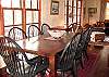 Perfect for those large family holiday gatherings, the dining table offers seating for eight.