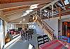 Kitchen is tucked behind the dining area.