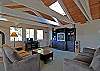 The upper level entertainment center is in the open loft.