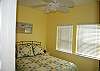Downstairs bedroom with queen bed
