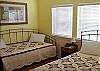 Queen Bed with Day Bed equipped with trundle that makes to Queen Size