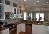 Exquisite Granite Counter tops, tile backsplash, every thing needed for the  Chef will be found in the well equipped kitchen.
