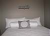 This bedroom has a queen sized bed with 2 twins built in the wall.  TV w/DVD Player