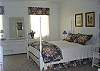 Upstairs bedroom with queen bed.