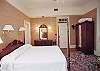 The master bedroom features traditional styling and comfort.