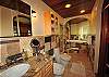 Upscale and modern in design this bathroom also has a whirlpool tub for total relaxation.