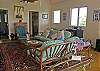 Also on the pool level is a family room that is both spacious and comfortable. Bring your favorite tunes, movies or games, or rent them at the local video store in Coral Bay.