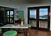 Gaze beyond Great Turtle to Coral Bay while preparing dinner or sipping morning coffee.