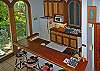 Kitchen And Bar With Fun And Colorful Seating
