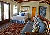 The open-air loft above the great room is a spot to read, relax or play a board game away from the crowd.  The queen bed and futon increases sleeping arrangements and has its own ½ bath.