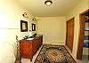 The fourth bathroom has a hand carved his/hers double vanity, large closets and walk-in shower. Tasteful furniture and lighting are located throughout the Manor.