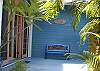 A stairway leads you from the parking area to Sapphire Breeze's front door, and the beginning of another world. The first of many arched French doors and windows, each measuring nine and one-half feet high, beckon you to enter.