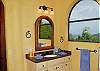 The bath on the lower level shares the same majestic views at the bedrooms.
