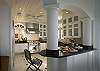 The gourmet kitchen comes complete with a Viking range and an outdoor Viking grill station.