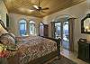 ...the sleeping area which has a king-sized bed and features a full walk-in closet (not shown)...