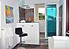 En suite bathrooms feature picture windows and 'rain' showers.