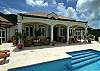 Outdoors is as thoughtfully designed as indoors.  Stroll across the patio at your leisure to wade into this easy accessed, fantastic pool.