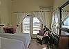 On the other end of the main level, the  second bedroom  has 2 extra long twin beds that can be easily converted into a king.