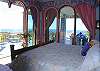 The second bedroom on this level overlooks the Jacuzzi deck, with a king sized bed, which can be split into twins. The adjoining bathroom has two doors - providing inside access to this bedroom for late night kitchen snacks.