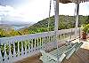 A colorful swing is the centerpiece of the large lower veranda. Below, banana and papaya trees sway in the breeze and make tasty breakfast treats!