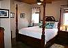 The 2 Pool Level bedroom suites are equally private, with separate A/C, safes and full-length closets for wedding/formal wear. Each has full baths w/ shower, painted by nationally known local artisans with tropical colors and faux designs.