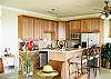 The kitchen layout on the lower level is strikingly similar to that on the upper level.