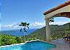 The views from Coral Oasis are spectacular and the privacy is superb. A graceful sweeping staircase leads to the lower level and the third bedroom suite.