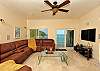 The Great room area is fully conditioned with a plush sofa  provide gathering space for everyone. Equipt with a  large 55-inch flat screen TV with satellite, DVD player and a iPod dock  ready for your entertainment. The glass doors open out to an ocean view Patio with cushioned seating and table.