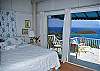Both bedrooms have sliding glass doors with fabulous views of Rendezvous Bay and the Caribbean beyond.