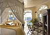 Each bedroom has an en suite bath, decorated with custom-crafted Italian tile in an individual color scheme.