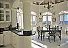 You can dine in the warm rays of the morning sunlight in the dining area off the kitchen-it has seating for 8 guests.