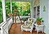 The comfortable porch furniture on either side of the entryway is just the beginning. Delightful accents are the norm here at Esprit.
