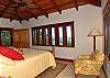 The view from the master bedroom is breathtaking. The king bed boasts a pillow-top mattress and the Tommy Bahama furnishings complete the ambiance.