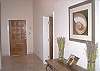 The Upper and lower level floor plans are nearly identical, with the same hallway leading from unit's front door all the way to the great room.