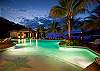 The pool is absolutely spectacular! It has a four-inch deep shallow shelf, perfect for sun loungers and for small children, a waterfall, and is bordered on the ocean side with a "beach," a strip of white sand set with more chaise lounges and a stone fire pit.