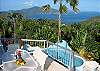 A third dining experience can be enjoyed from the spacious wrap around deck on the main level.  Expansive down-island views and swaying native palms enhance this exceptional setting.