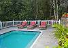 A recessed bench lines two sides of the pool and steps in one corner make entry easy.